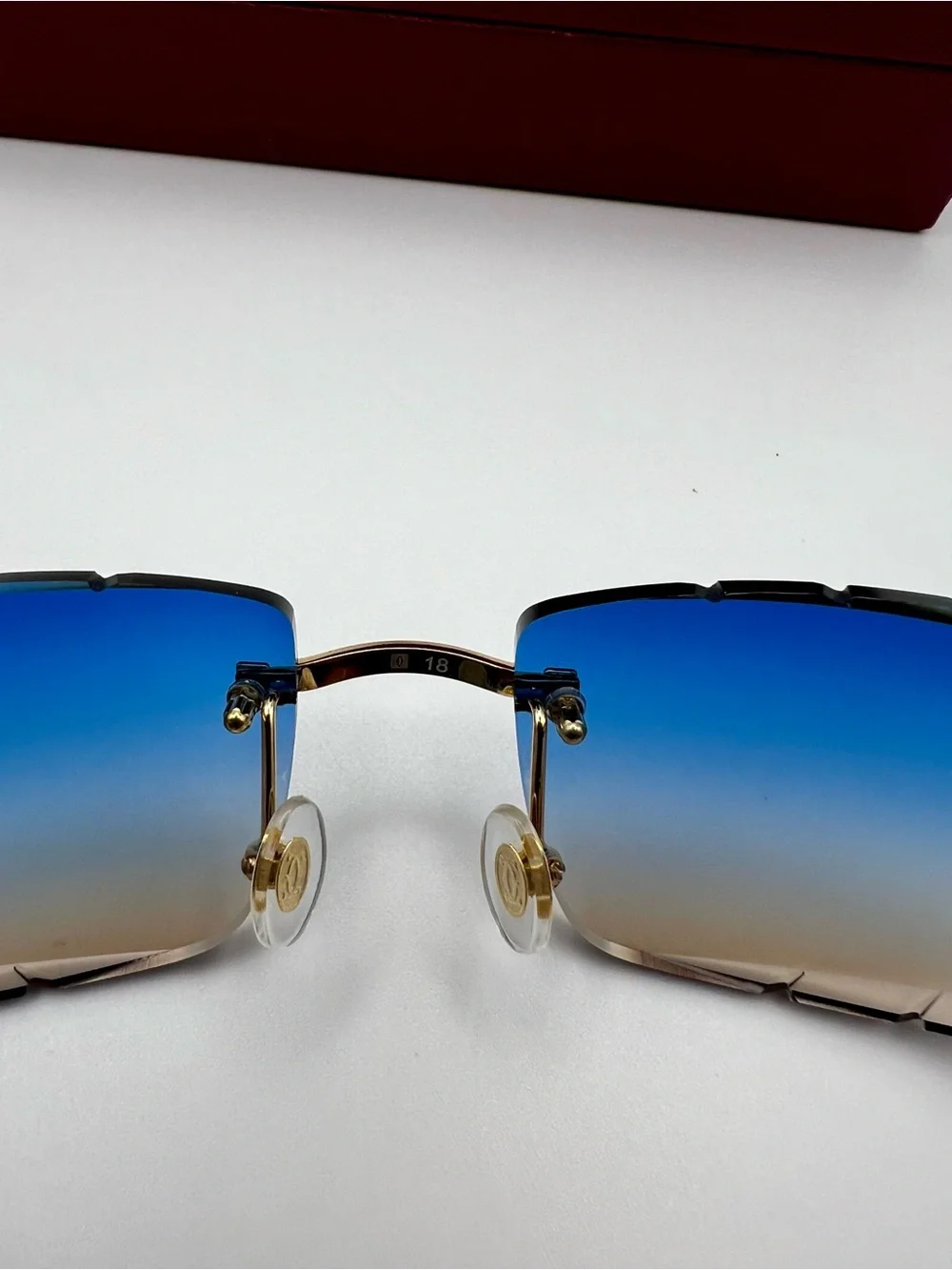 Cartier Blue Gradient Rimless Sunglasses with Gold and White Accents